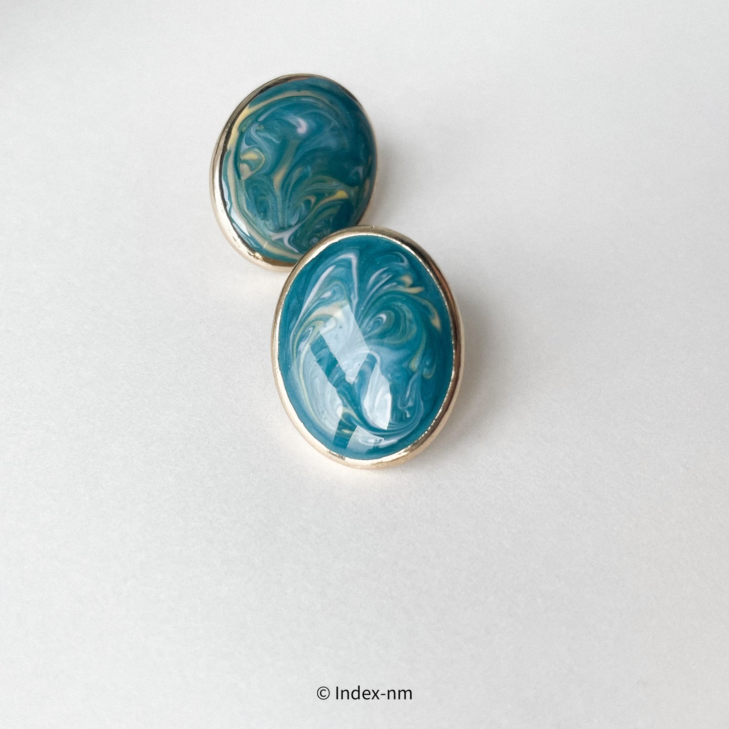 Chaos | Blue Oval Ink Studs